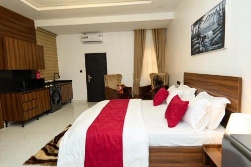 Katil atau katil-katil dalam bilik di Oasis Suites Guzape