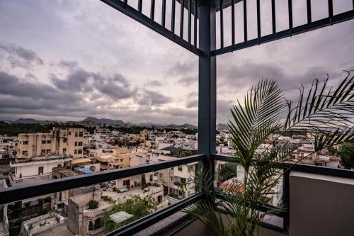 a view of a city from a building at Hotel Lake Metro in Udaipur
