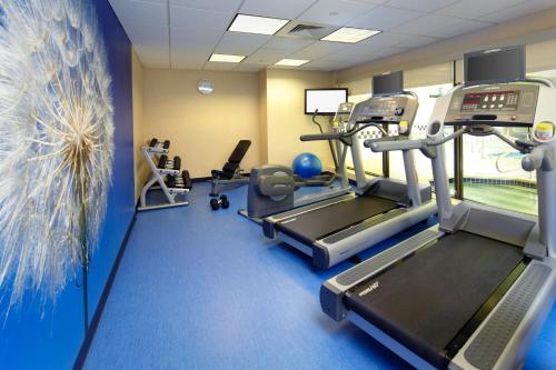 a gym with cardio equipment and a treadmill at SpringHill Suites by Marriott Pittsburgh Washington in Washington