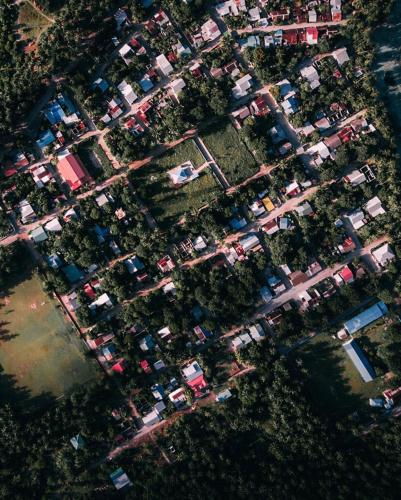 an aerial view of a parking lot full of vehicles at Rihiveli inn 
