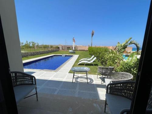 4 bedroom twin villa in Caesar Bay El Sahel , Ras El Hekma