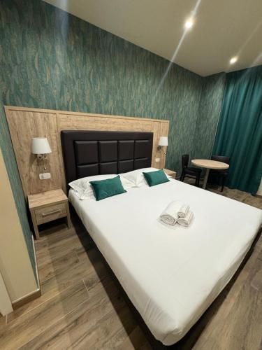 Ricaroka exclusive room & spaにあるベッド