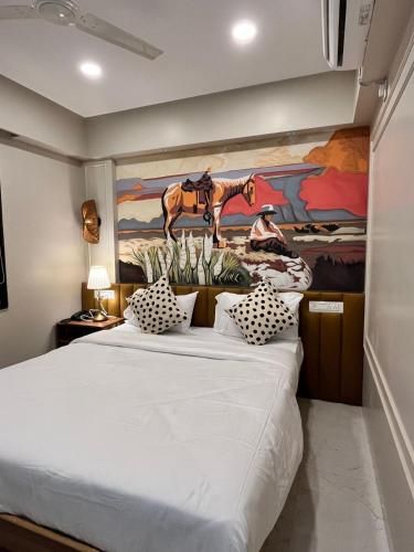Postel nebo postele na pokoji v ubytování Boutique Stay By One Tree Stays Pune Kharadi