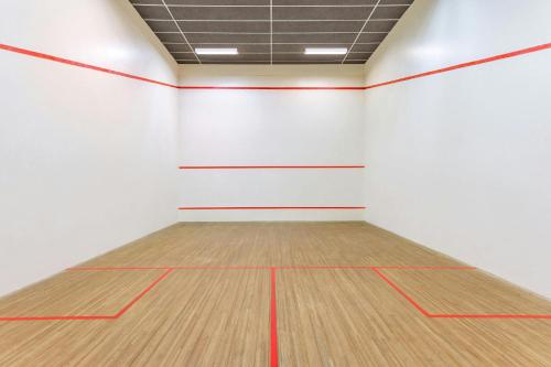 an empty gymnasium with a basketball court at Protea Hotel by Marriott Karridene Beach in Amanzimtoti