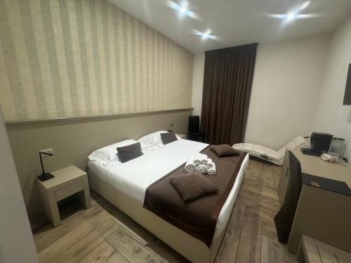 Ricaroka exclusive room & spaにあるベッド