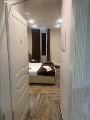 Ricaroka exclusive room & spaにあるベッド