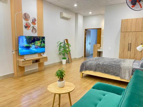 Televisyen dan/atau pusat hiburan di AM Hotel & Apartment