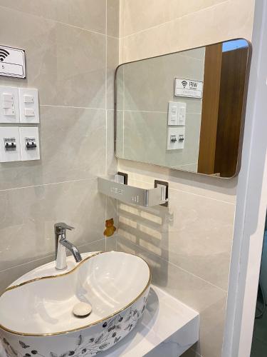 Bilik mandi di AM Hotel & Apartment