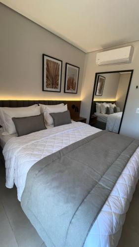 Postel nebo postele na pokoji v ubytování Pyrenéus Residence Resort