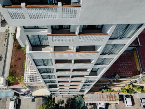 an overhead view of an apartment building with balconies at The Scenic Hotel in Phnom Penh