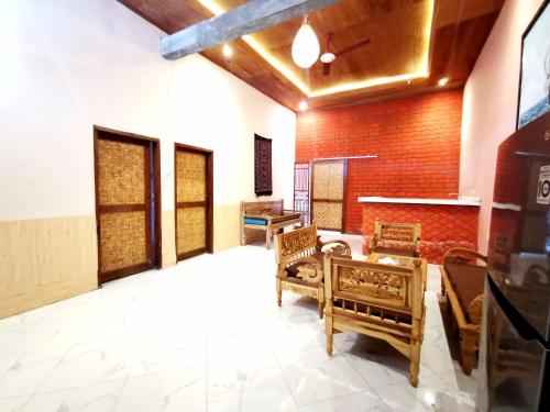 Kuchyň nebo kuchyňský kout v ubytování Sawah Homestay