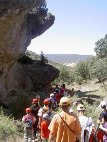 a group of people walking on a trail at Albergue Ciudad del Doncel in Sigüenza