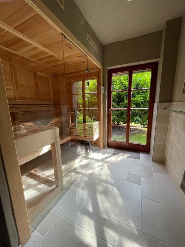 a bathroom with a sink and a window at FeWo Naturgeflüster - Mecklenburger Outback - Garten & Kamin - Private Sauna in Zölkow