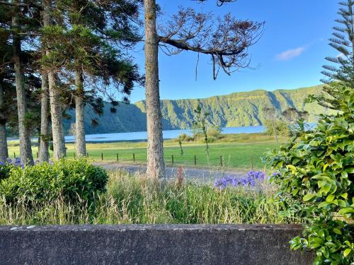 a view of a park with trees and a lake at Lakeview Green Paradise in Sete Cidades