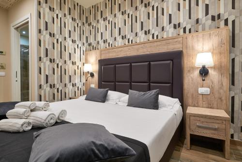 Ricaroka exclusive room & spaにあるベッド