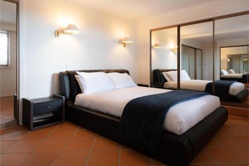 Cama o camas de una habitación en The Yard - Comfortable Home in Riverside