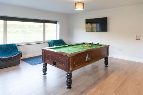 a room with a pool table in a room at Willow Valley in Monaghan