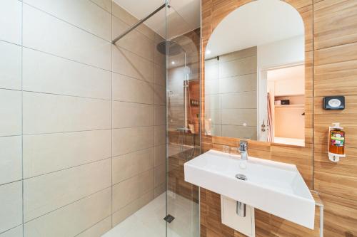 Koupelna v ubytování Hôtel Exsel Ermitage