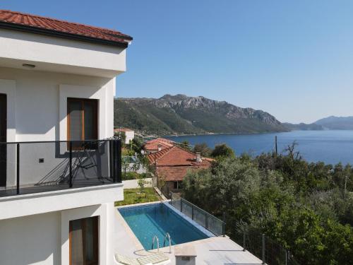 a view of the water from a building with a swimming pool at Asiyan Villas in Marmaris