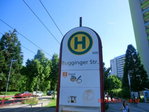 a sign in front of a bus stop at Vogesenblick Oetjens in Freiburg im Breisgau