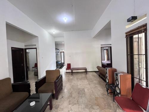 Posezení v ubytování Hotel O Bungalow Homestay