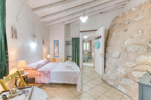 Кровать или кровати в номере Agriturismo Baccole