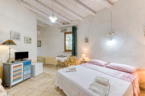 Кровать или кровати в номере Agriturismo Baccole