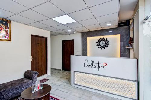 a waiting room at a office with a reception desk at Hotel O Connect in Jaipur