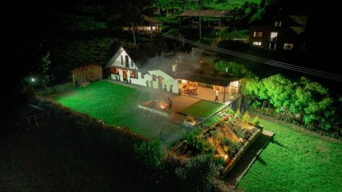 an aerial view of a house at night at ChaletElMuisca RaicesQueAcogen in Nemocón