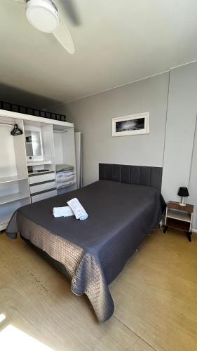 Katil atau katil-katil dalam bilik di Apartamento no Centro de Friburgo