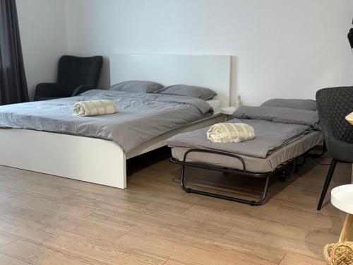 Postel nebo postele na pokoji v ubytování Center Studio type apartment