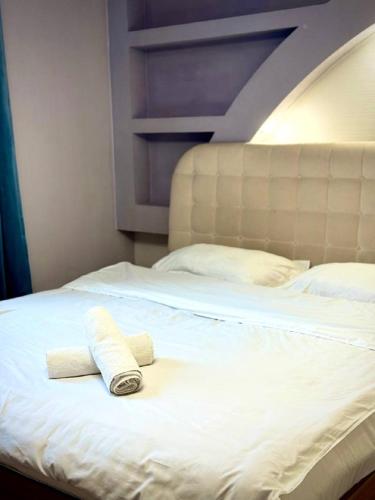 Postel nebo postele na pokoji v ubytování Guest House Frunze