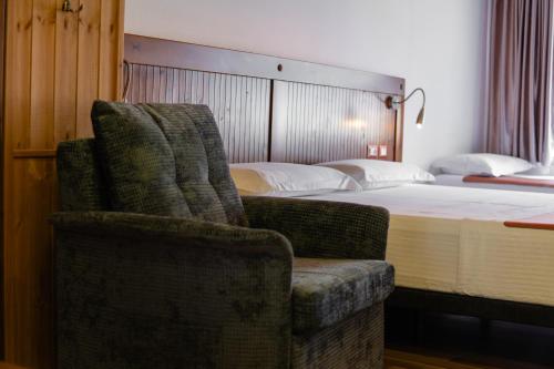 Postel nebo postele na pokoji v ubytování Hotel Kodra