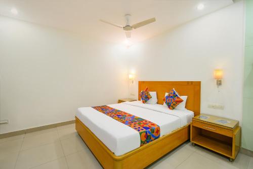 FabHotel A&M - Nr LV Prasad Institute, Banjara Hillsにあるベッド