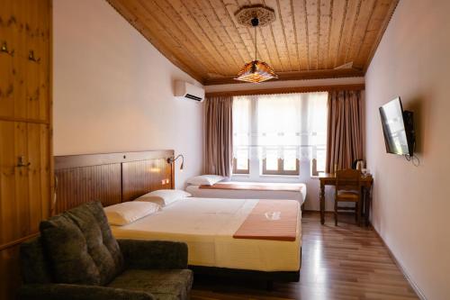 Postel nebo postele na pokoji v ubytování Hotel Kodra