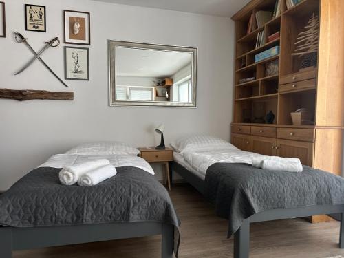 Ένα ή περισσότερα κρεβάτια σε δωμάτιο στο Apartments 5