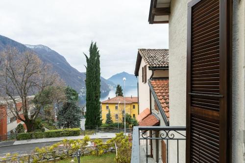 a view from the balcony of a house at Rose 2 Apartment by Quokka 360 - duplex on 2 floors with balcony in Ruvigliana