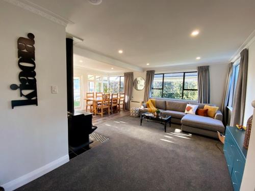 En eller flere senge i et værelse på A Taste of Kiwi close to Event Centres