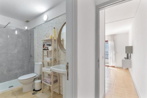 a bathroom with a toilet and a sink at Apartamentos Isla Bonita- A - 29 in Los Cancajos