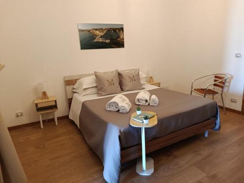 Ένα ή περισσότερα κρεβάτια σε δωμάτιο στο Vacanze Mariu'