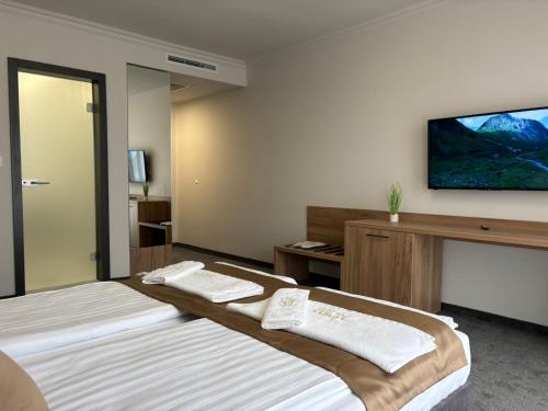 Katil atau katil-katil dalam bilik di Hotel Odrys
