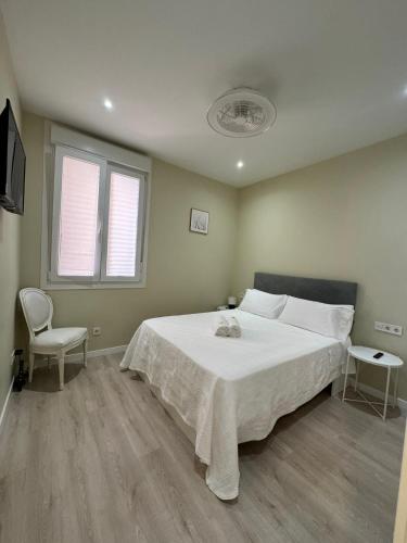 Postel nebo postele na pokoji v ubytování HABITACION CENTRAL CON WIFI