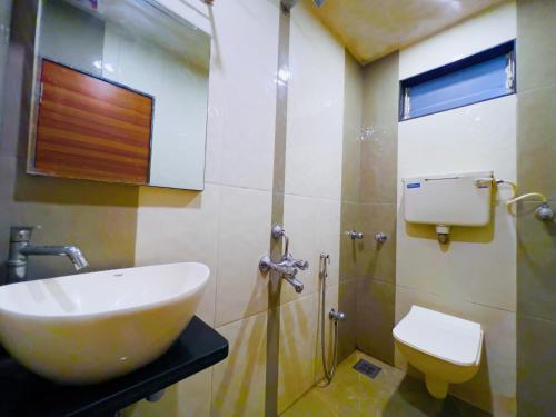 Koupelna v ubytování Hotel Dwaraka