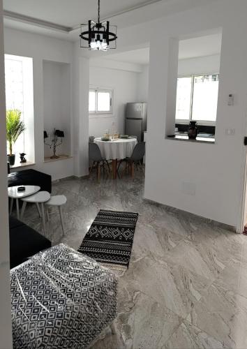 Posezení v ubytování charming bright house la marsa