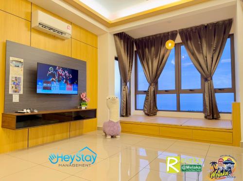 Televisyen dan/atau pusat hiburan di Bali Residence Melaka By Heystay Management