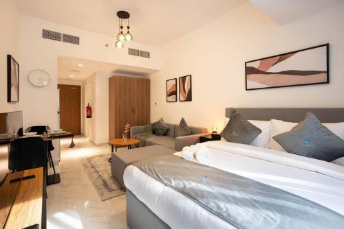 Posezení v ubytování Bloomfields Spacious Stu in Oasis Masdar City