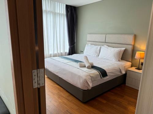 Postel nebo postele na pokoji v ubytování Vortex Family suites Apartment