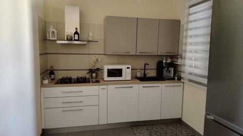 Kuchyň nebo kuchyňský kout v ubytování Casa del Minatore