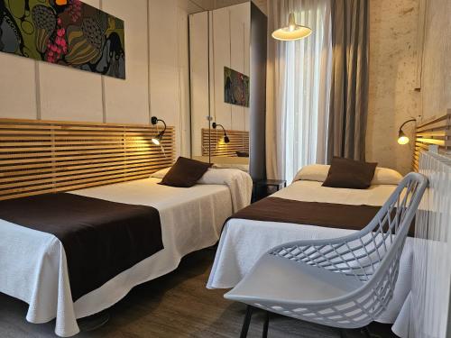 Cama o camas de una habitación en Hotel Palermo