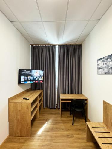 Hotel Fabrik Vösendorfにあるテレビまたはエンターテインメントセンター